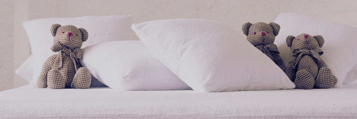 teddy bears on waterproof mattress cover and pillows