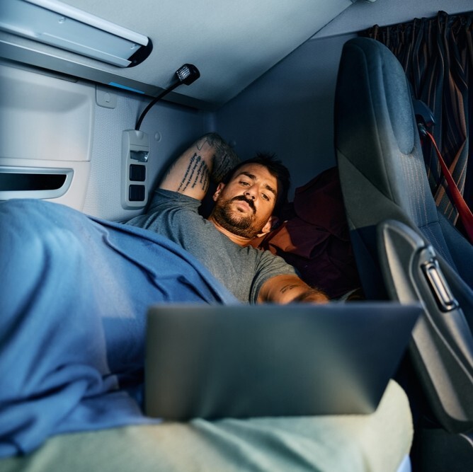 Driver in Semi Truck Sleeper Cab