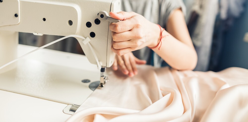 Woman at sewing machine